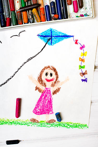 istock Colorful drawing: Little girl playing with a kite 534453806