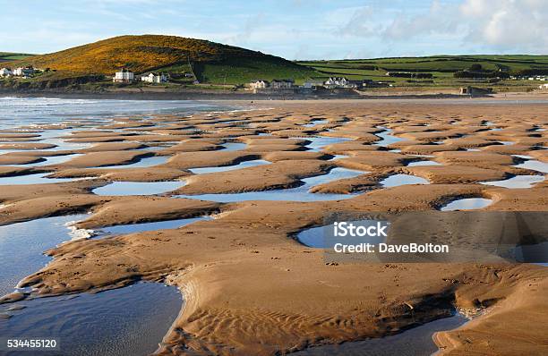 Tidal Pools On A Sandy Beach In Devon Stock Photo - Download Image Now - Devon, Croyde Bay, Beach