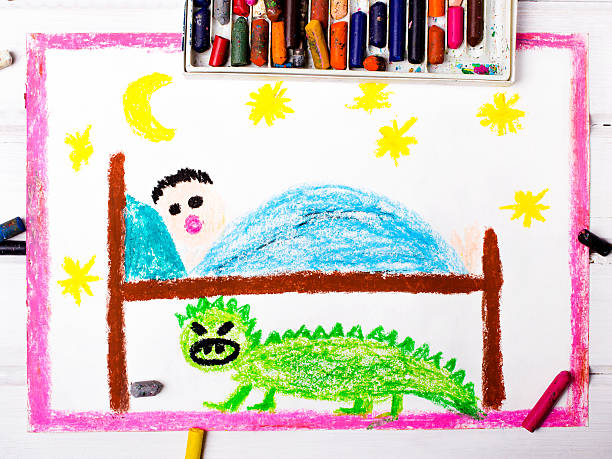 istock clorful drawing: scary monster under the children's bed 534456090