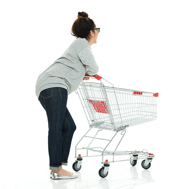 istock Woman leaning on shopping cart 534457546