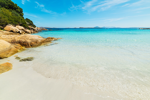 white sand and blue sea in Capriccioli beach, Sardinia