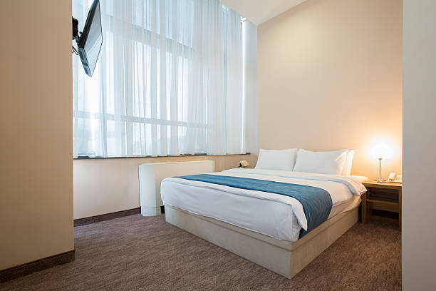 istock Elegant hotel bedroom interior 534459278