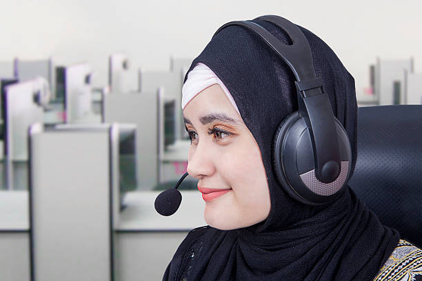 istock Female hotline operator with headphones 534459524