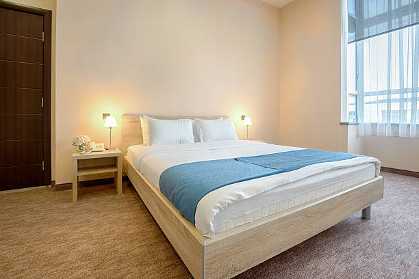 istock Elegant hotel bedroom interior 534459540