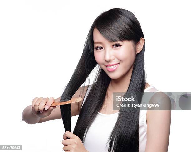 Woman With Health Hair Care Stock Photo - Download Image Now - 2015, Adult, Arts Culture and Entertainment