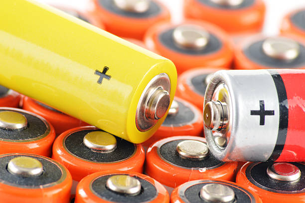 istock Composition with alkaline batteries. Chemical waste 534472509