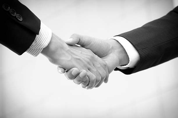 istock Handshake of businessmen 534474085