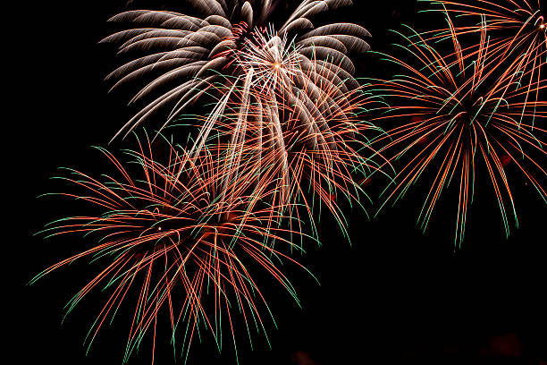 istock Colorful fireworks on a night sky background. 534475783