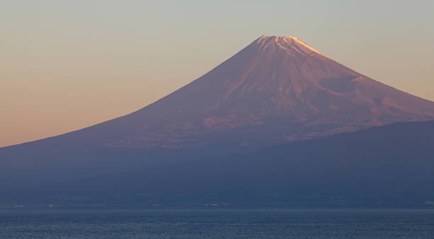 istock Mountain Fuji and sea at sunrise time 534475883