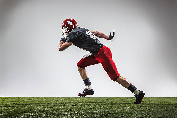 istock American football player in action 534476254