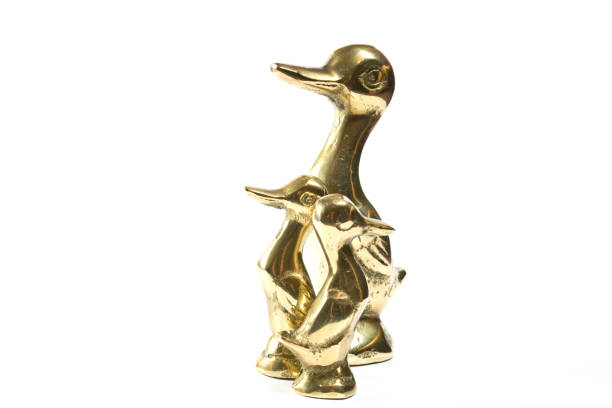 istock Three Brass Mother and Duckling Ducks 534476972