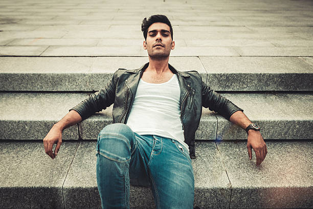 istock Stylish man in the white T-shirt, leather jacket and 534479584