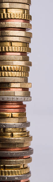 closeup from a stack of many coins stock photo