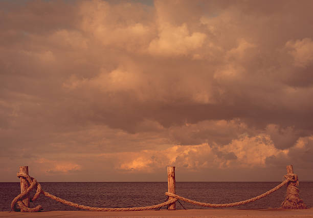 Seafront and cloudy sky in autumn. Turkey, Erdek, coast of Marmara. Toned landscape.