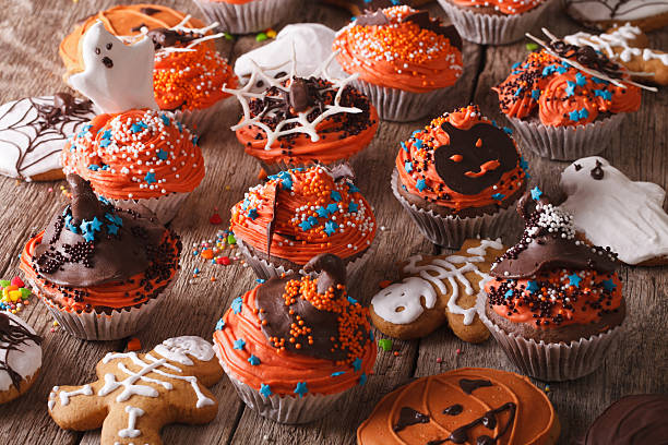 istock Traditional Halloween cupcakes and gingerbread cookies. horizontal 534481026