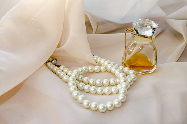 istock Vintage Perfume Bottle with white pearls 534481858