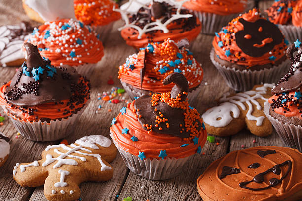 istock Halloween cupcakes and gingerbread cookies close-up. Horizontal 534481964