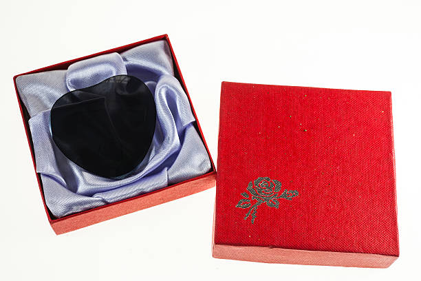 istock Black heart in red gift boxes on Valentine's Day. 534482353