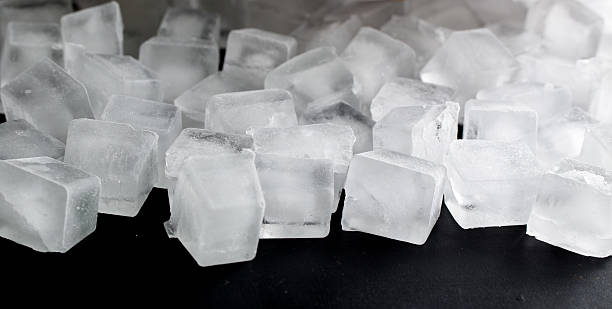 istock pile of different ice cubes on black background 534484938