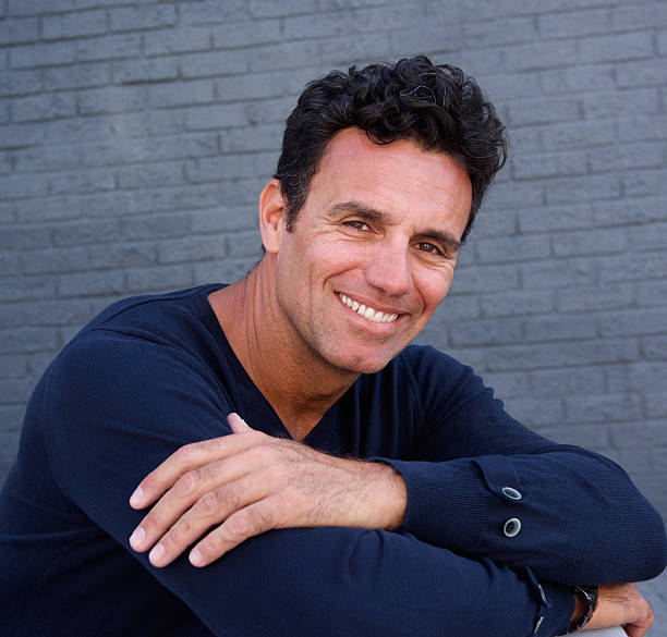 istock Older male fashion model smiling 534485084