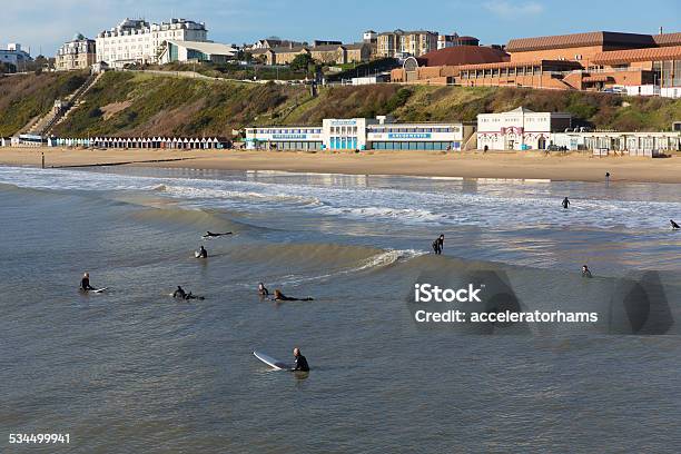 Surfers Enjoying Winter Sunshine Bournemouth Beach Dorset Uk Stock Photo - Download Image Now