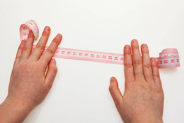 istock Measuring tailor tape measure 534502823