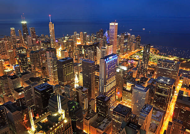 istock Chicago skyline illuminated at night, aerial view 534503274
