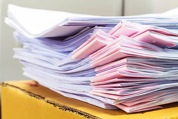 istock Stack of business report paper files with black clips 534503856