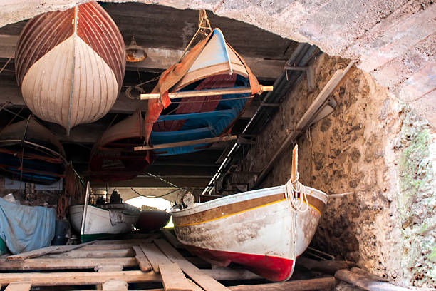 The small wooden boats for fishing stowed away waiting to be used again