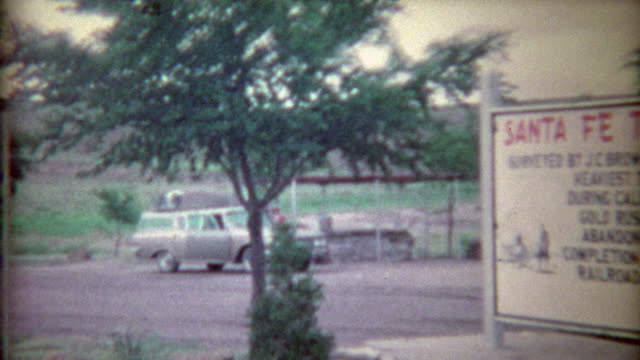 1966: Santa Fe Trail wayside with family truckster station wagon road trip.