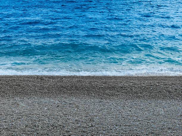 gray praia - abstract backdrop beach close up - fotografias e filmes do acervo