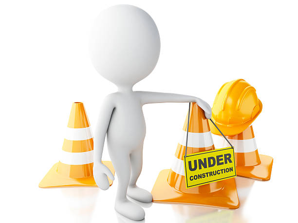 istock 3d white people stop sign with traffic cones. Under construction 534532959