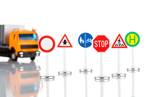 istock Toy road signs and truck 534533433