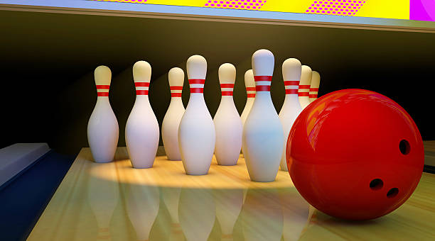 istock bowling ball and pins on the track 534536861