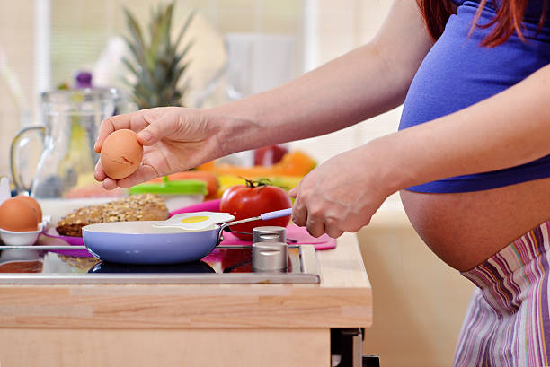istock pregnant women in the kitchen 534538291