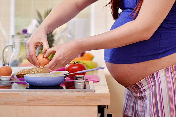 istock pregnant women in the kitchen 534538293