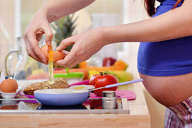 istock pregnant women in the kitchen 534538297