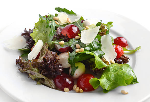 Close-up photo of salad with cherry tomatoes and lettuce
