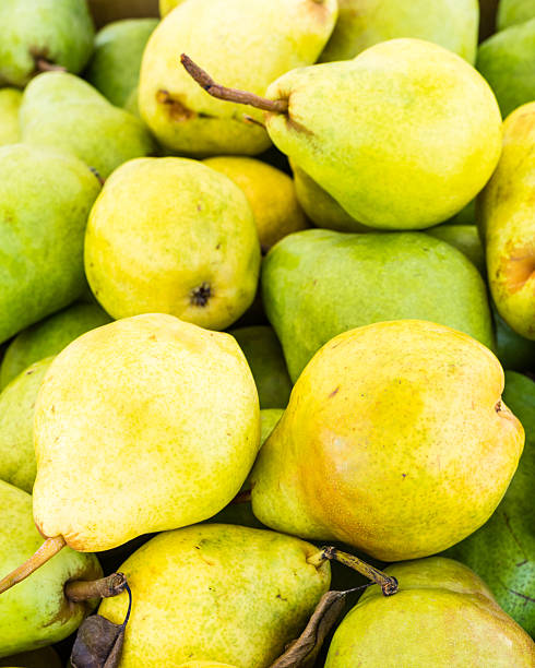 Freshly picked Bartlett pears Fresh ripe Bartlett pears on display bartlett pear stock pictures, royalty-free photos & images