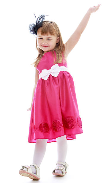 istock Little girl in a smart red dress 534541663