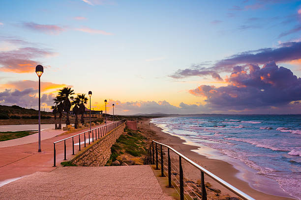 istock Wonderful sunset over a quiet sea and view of seafront 534547698