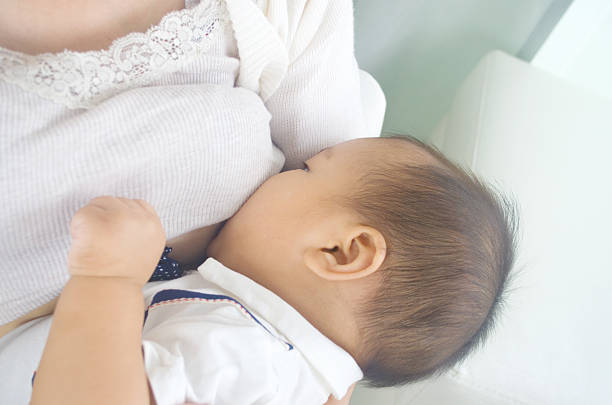 istock Asian mother breastfeeding 534552030