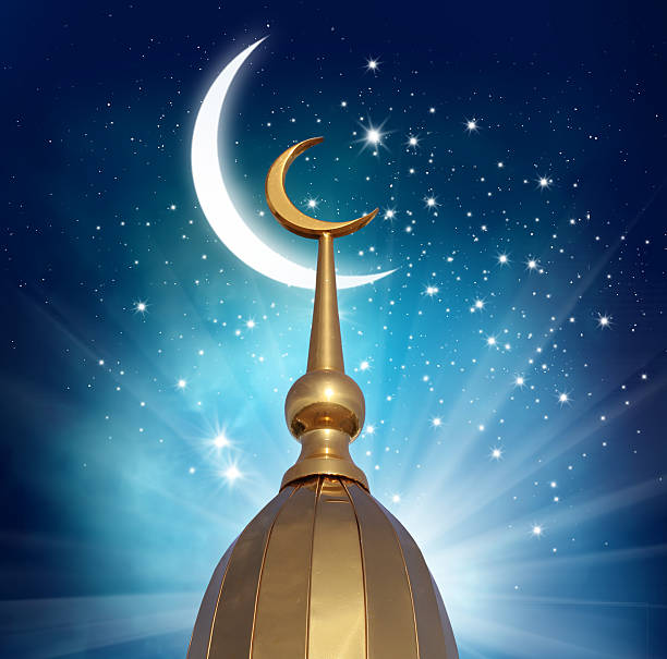 istock Ramadan Kareem background.Crescent moon at a top of a mosque 534552638