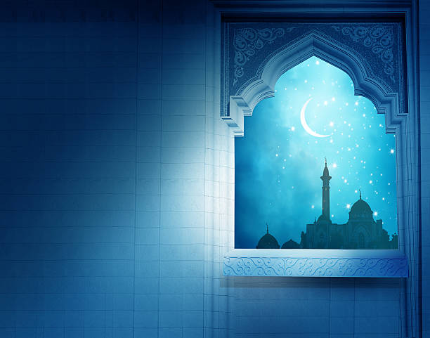istock Ramadan Kareem background.Mosque window with shiny crescent moon 534552806