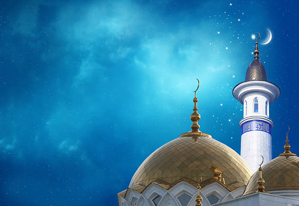istock Ramadan Kareem background.Crescent moon at a top of a mosque 534556610