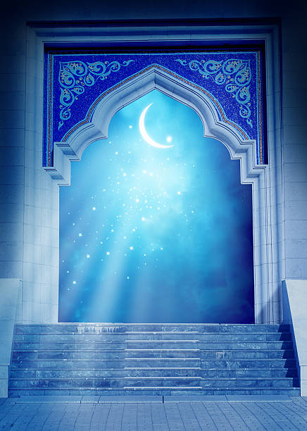 istock Ramadan Kareem background.Mosque door with shiny crescent moon 534556820