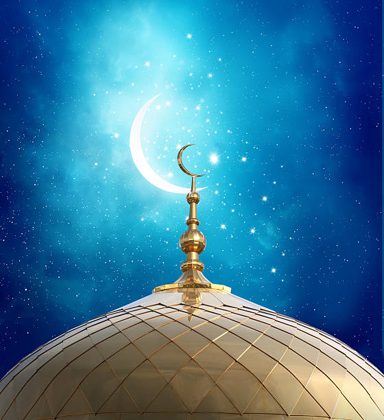 istock Ramadan Kareem background.Crescent moon at a top of a mosque 534557666