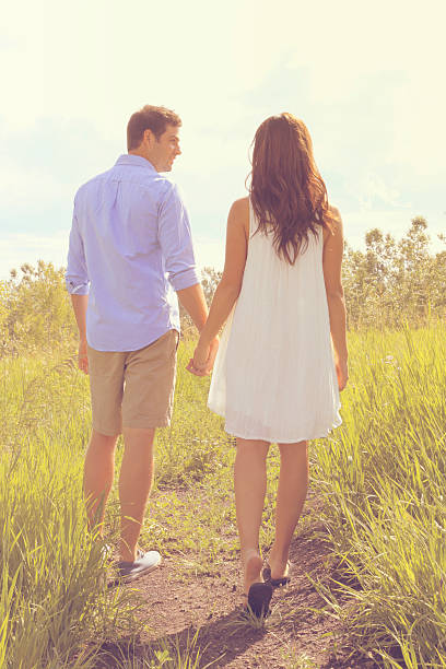 istock Girl and guy holding hands 534560620