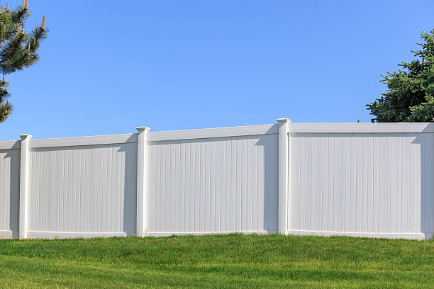 White vinyl fence stock photo