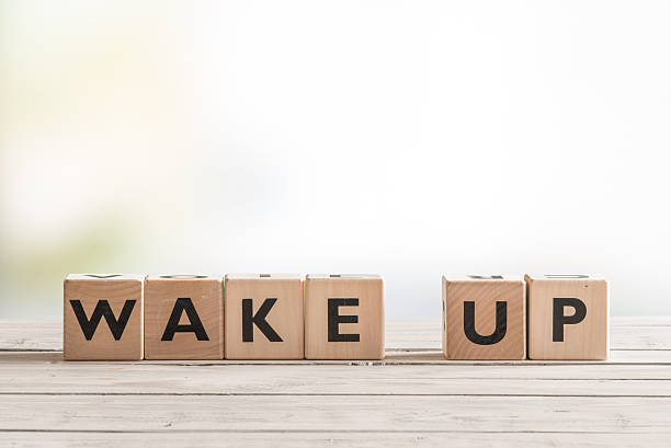 istock Wake up sign with wooden cubes 534563542